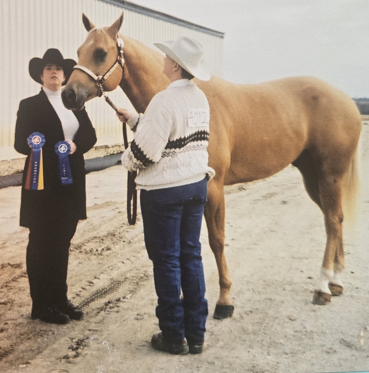 Michael Hahn, Leslie Street, and Ticon after a Grand Champion win
